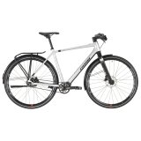 Ein Fahrrad mit Gepäckträger und Schutzblechen.