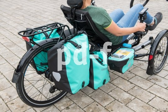 Liegeradspezialist HP Velotechnik bietet ausgefeilte Lösungen für den Gepäcktransport an seinen Trikes an. Packtaschen jeder Größe finden damit schwerpunktgünstig Platz hinter und unter dem Sitz.